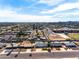 Aerial view of a residential neighborhood with houses and a school at 1209 E Marigold Ln, Tempe, AZ 85288