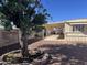 Backyard with covered patio, storage shed and gravel at 13013 N 19Th Pl, Phoenix, AZ 85022