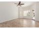 Bright bedroom with tile floors and window at 13345 W Cypress St, Goodyear, AZ 85395