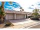 House exterior with two-car garage and desert landscaping at 13345 W Cypress St, Goodyear, AZ 85395