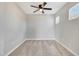 Neutral bedroom with a ceiling fan and carpet flooring at 13441 W Rose Ln, Litchfield Park, AZ 85340