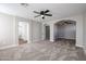 Main bedroom with high ceilings, carpet, and ensuite access at 13441 W Rose Ln, Litchfield Park, AZ 85340