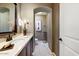 Powder room with single sink and toilet at 13462 E Wethersfield Rd, Scottsdale, AZ 85259