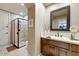 Bathroom with a walk-in shower and a modern vanity at 13462 E Wethersfield Rd, Scottsdale, AZ 85259