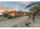 Elegant home exterior showcasing beautiful architecture and desert landscaping at 13462 E Wethersfield Rd, Scottsdale, AZ 85259