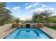 Relaxing pool with mountain views and tiled accents at 13462 E Wethersfield Rd, Scottsdale, AZ 85259