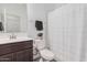 Simple bathroom with shower, toilet, and vanity at 14104 W Bronco Trl, Surprise, AZ 85387