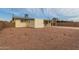 Large backyard with gravel, storage shed, and fence at 1416 S Lawther Dr, Apache Junction, AZ 85120