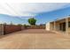 Large backyard with gravel, and block wall at 1416 S Lawther Dr, Apache Junction, AZ 85120