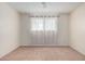 Simple bedroom with ceiling fan and neutral decor at 1416 S Lawther Dr, Apache Junction, AZ 85120