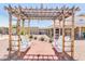 Relaxing community patio with pergola and seating at 1416 S Lawther Dr, Apache Junction, AZ 85120