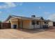 House exterior showcasing carport and gated driveway at 1416 S Lawther Dr, Apache Junction, AZ 85120