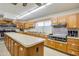 Well-equipped community kitchen with ample counter space at 1416 S Lawther Dr, Apache Junction, AZ 85120