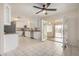 Bright kitchen with white cabinets, stainless steel appliances, and a large island at 1416 S Lawther Dr, Apache Junction, AZ 85120