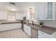 Modern kitchen with white cabinets and stainless steel appliances at 1416 S Lawther Dr, Apache Junction, AZ 85120