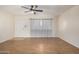 Spacious living room featuring hardwood floors and ceiling fan at 1416 S Lawther Dr, Apache Junction, AZ 85120