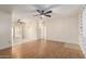 Living room with hardwood floors and two ceiling fans at 1416 S Lawther Dr, Apache Junction, AZ 85120