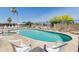 Inviting community pool with a spa and lounge chairs at 1416 S Lawther Dr, Apache Junction, AZ 85120