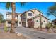 Two-story house with desert landscaping and a large driveway at 16118 W Gibson Ln, Goodyear, AZ 85338