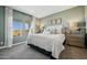 Serene bedroom with a king-size bed and calming decor at 16530 N Dante Way, Maricopa, AZ 85138