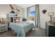 Dinosaur-themed bedroom with a fun and playful design at 16530 N Dante Way, Maricopa, AZ 85138