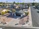 Single story home situated on a residential street with mature trees nearby at 1703 E Laguna Dr, Tempe, AZ 85282