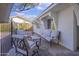 Relaxing patio with metal furniture and a view of the backyard at 1703 E Laguna Dr, Tempe, AZ 85282