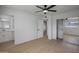 Bright bedroom with mirrored closet and ensuite bathroom at 1703 E Laguna Dr, Tempe, AZ 85282