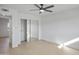 Bedroom with mirrored closet and wood-look floors at 1703 E Laguna Dr, Tempe, AZ 85282