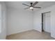 Spacious bedroom featuring light walls and a mirrored closet at 1703 E Laguna Dr, Tempe, AZ 85282