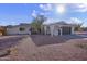 Updated single story home with a landscaped front yard and arched entryway at 1703 E Laguna Dr, Tempe, AZ 85282