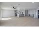 Spacious living area featuring light wood floors and an open layout at 1703 E Laguna Dr, Tempe, AZ 85282