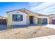 Inviting single-story home featuring desert landscaping, an attached two-car garage, and covered entrance at 17469 N 66Th Ave, Glendale, AZ 85308