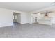 Open living area showing ceramic tile floors and open access to kitchen at 17469 N 66Th Ave, Glendale, AZ 85308