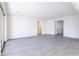 Living room featuring patio access, neutral colors and tile flooring at 17469 N 66Th Ave, Glendale, AZ 85308