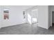 Bedroom with ensuite bathroom featuring tile flooring and bright windows at 17469 N 66Th Ave, Glendale, AZ 85308