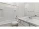 Clean bathroom with a bathtub, toilet, and vanity at 17724 W Sanna St, Waddell, AZ 85355