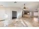 Spacious living room with tile floors and high ceilings at 18487 N 111Th Dr, Surprise, AZ 85378