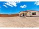 Large backyard with covered patio, ideal for outdoor entertaining and relaxation at 18556 E Dario Rd, Gold Canyon, AZ 85118
