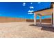 Extensive backyard with a covered patio, ideal for relaxing and outdoor gatherings at 18556 E Dario Rd, Gold Canyon, AZ 85118