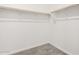 Spacious walk-in closet with ample shelving, perfect for organization at 18556 E Dario Rd, Gold Canyon, AZ 85118