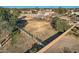 Aerial view of property with fenced pasture area at 19530 E Via Del Oro --, Queen Creek, AZ 85142