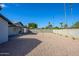 Spacious backyard with gravel and a covered patio at 2112 E Fremont E Dr, Tempe, AZ 85282