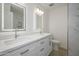 Bathroom with double vanity, marble tile, and updated fixtures at 2112 E Fremont E Dr, Tempe, AZ 85282