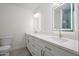 Bathroom with double vanity and white cabinets at 2112 E Fremont E Dr, Tempe, AZ 85282