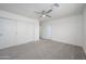 Bedroom with grey carpet, ceiling fan, and closet at 2112 E Fremont E Dr, Tempe, AZ 85282