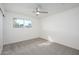 Bright bedroom with ceiling fan and grey carpet at 2112 E Fremont E Dr, Tempe, AZ 85282