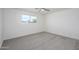 Bedroom with grey carpet, ceiling fan, and window at 2112 E Fremont E Dr, Tempe, AZ 85282