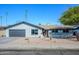 Updated mid-century modern home with gray exterior and red door at 2112 E Fremont E Dr, Tempe, AZ 85282