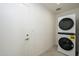 Laundry room with stackable washer and dryer at 2112 E Fremont E Dr, Tempe, AZ 85282